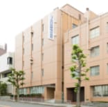 The head office building in the Minoo Textile Complex (photo: present building)